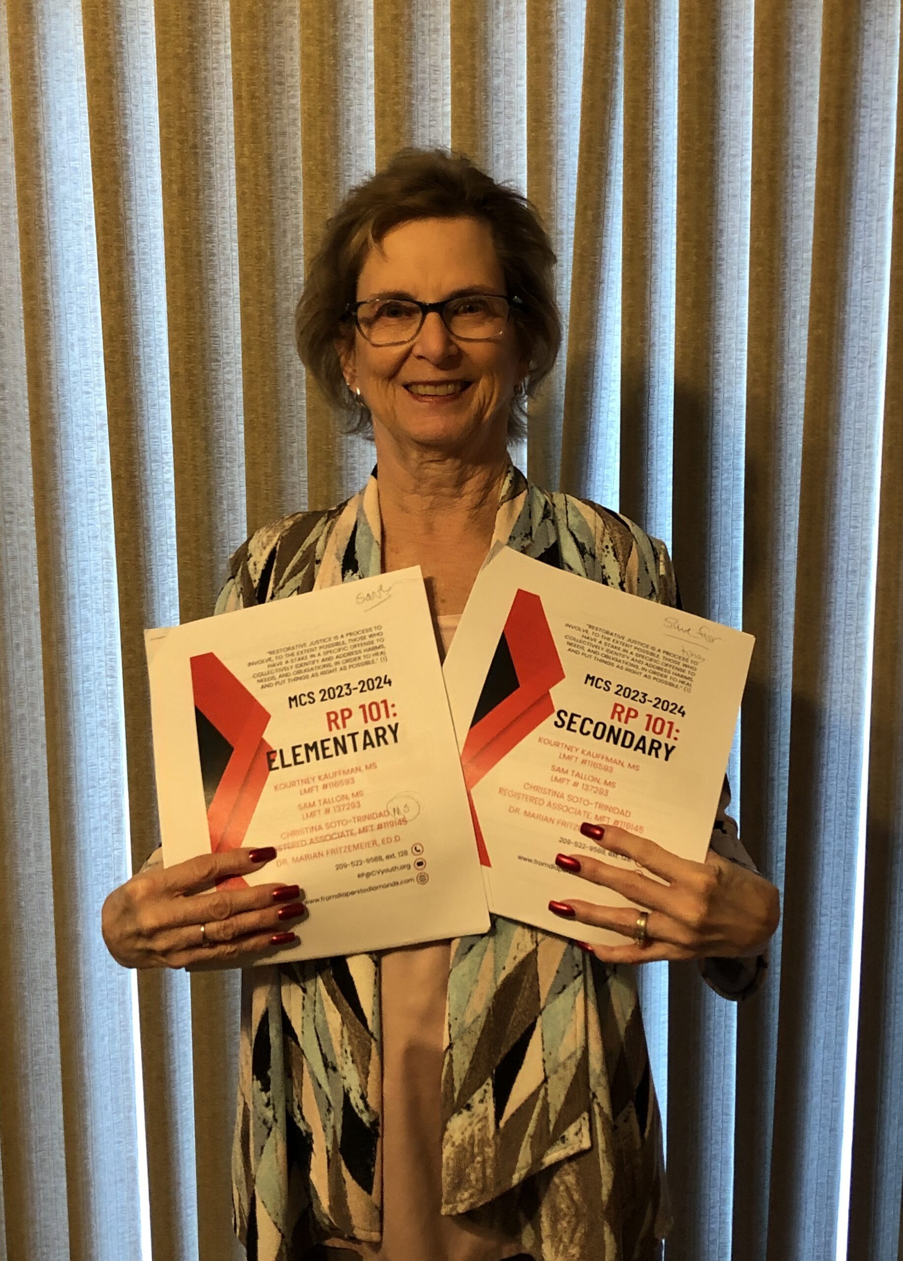 Dr. Marian Fritzemeier, Ed.D. with title pages for elementary and secondary.
